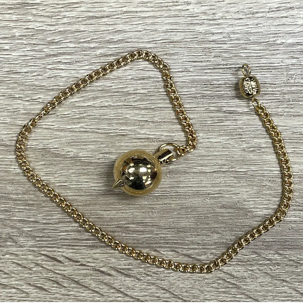 Péndulo metálico bronce