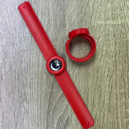 [AM058] Brazalete infantil difusor. Correa roja, modelo Hada